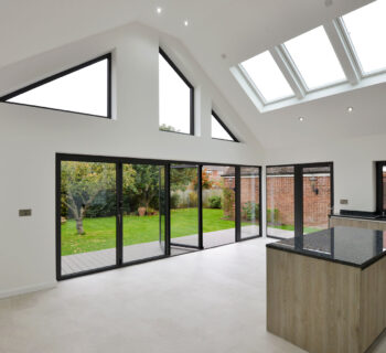 Bifolding Aluminium doors with rooflights and bespoke windows for bungalow extension in essex