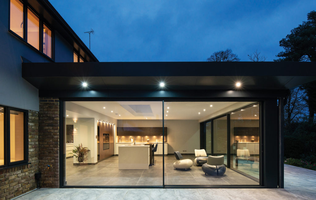 Sliding doors for modern extension open out onto patio