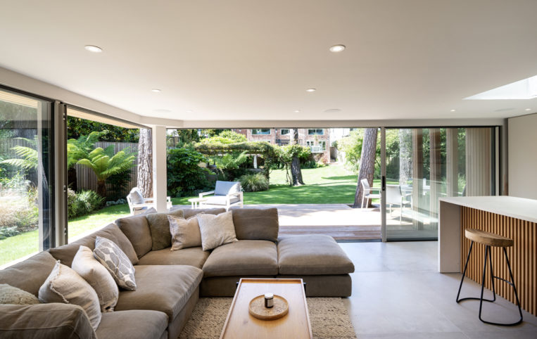 Garden room interior with views through sliding doors