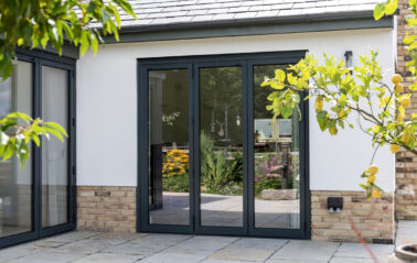 full height glass bifold doors with 3 panels