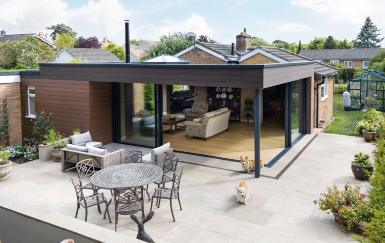 Corner sliding doors for bungalow extension