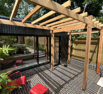 Sliding doors under pergola